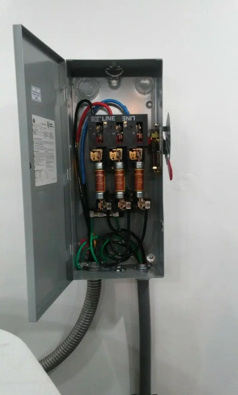 Three-phase disconnect switch installed for Smoke Detector Installation in Stockbridge